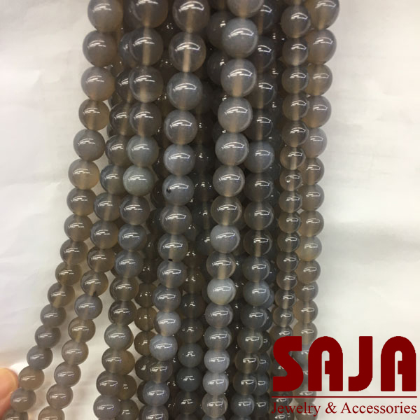 ban-si-chuoi-hat-da-thach-anh-xam-khoi