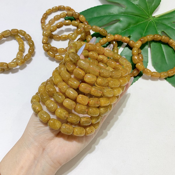 vong-chuoi-thach-anh-toc-vang-hat-tru-5a